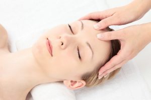 13978434 - young caucasian woman facial massage